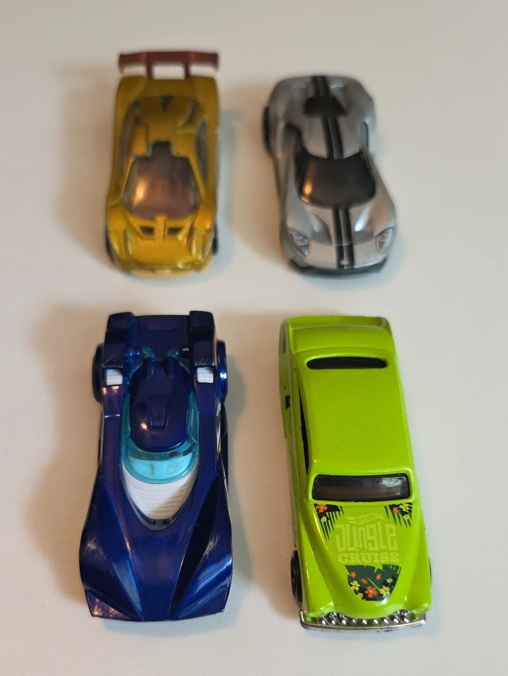Assorted Hot Wheels Cars - Ford GT, Fast Fish, Mazda RX7, Dodge Charger And More